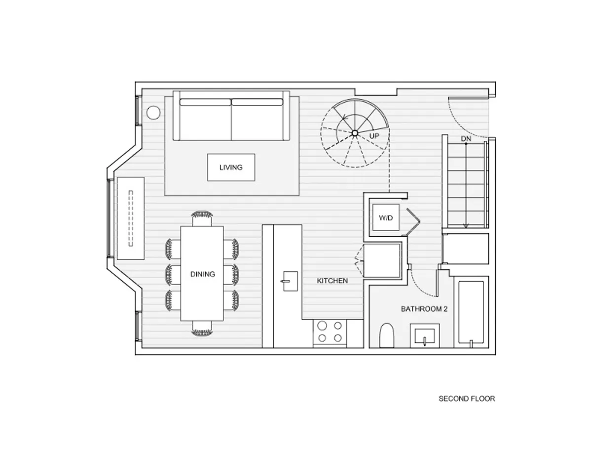 A warm, open-plan space with clear sightlines from the kitchen to the dining table and living area, including a glimpse of a bathroom. The setup encourages family gatherings, entertaining guests, and easy conversation between spaces.